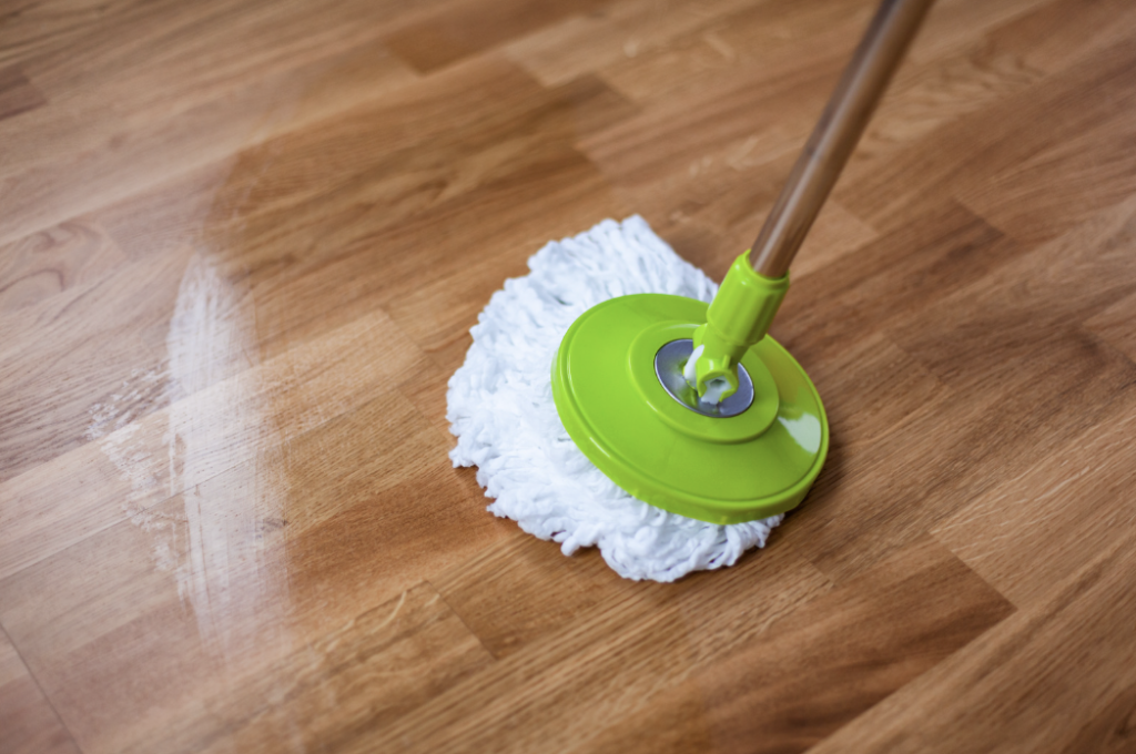 A Simple Weekly Cleaning Schedule for a Tidy Home mop the floors
